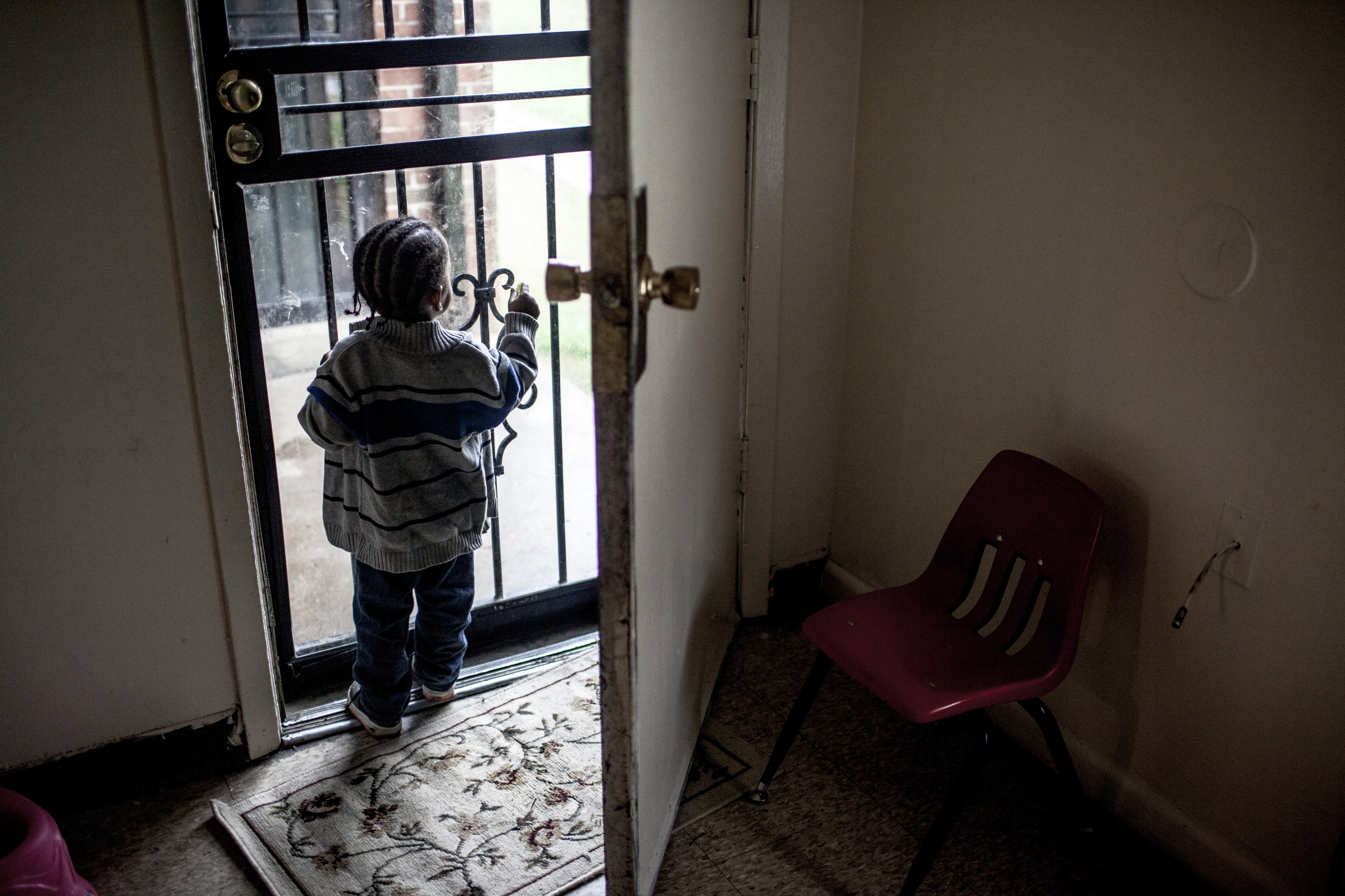 Boy in rent subsidized apartment